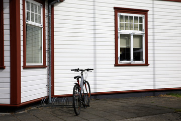 Fototapeta premium Seydisfjordur / Iceland - August 29, 2017: Houses in the fjord of Seydisfjordur village, Iceland, Europe
