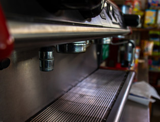 Fototapeta na wymiar Professional coffee machine in a Bar