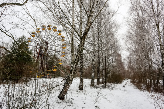 Abandoned amusement park in ghost town Prypiat. Priryat, Chornobyl exclusion zone. December 2016
