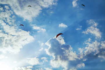 Fethiye, Mugla/Turkey- August 19 2018: Bottom up view of tandem paragliders on sky.