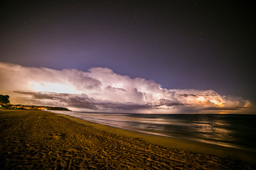 Lightning in Platja Llarga beach, Tarragona, Spain