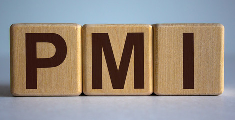 Concept word 'PMI' on cubes on a beautiful white background.