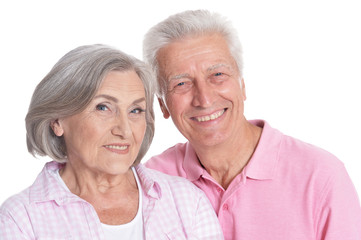 Close up portrait of happy senior couple isolated 