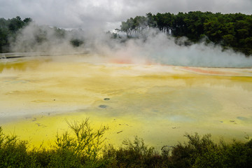 WAI-O-TAPU, NEW ZEALAND - MARCH 03, 2020: Steam clouds rising above the Champagne pool