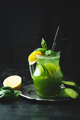 Cucumber and basil lemonade in a jar