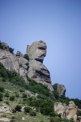 Rock of interesting unusual shape. A face-shaped stone called Catherine the Great. Valley of ghosts in Crimea, Russia