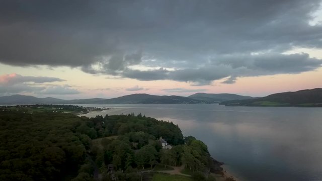 sunset over the lake aerial slow pan