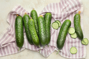 Green cucumbers on white background