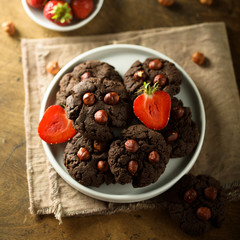 Homemade chocolate cookies with hazelnut and strawberry