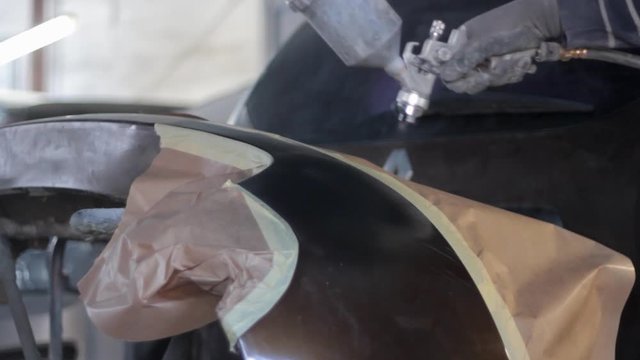 Automotive primer aplication before painting the car