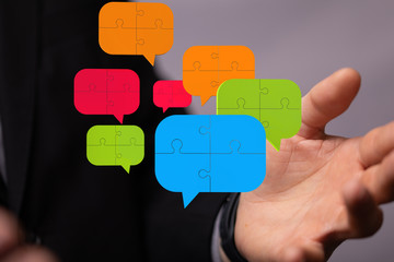 Fototapeta premium ilustration of a communication concept. The word communication with colorful dialog speech .