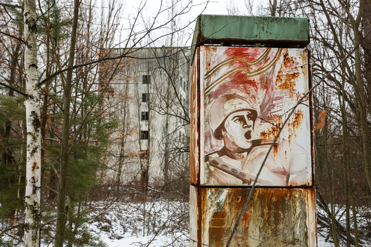 Soviet agitation stand in ghost town Prypiat. Collapsing buildings in Pripyat, Chornobyl exclusion zone. December 2016