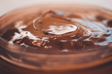 Moisturizing jelly cream with snail mucin closeup. Korean cosmetics. Skin care. Cosmetology. Healthy lifestyle.