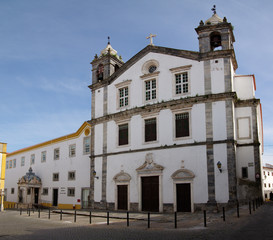 Salvador church facade and public library entrance at Elvas