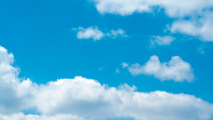 Naklejka na ściany i meble Close-up beautiful blue sky with clouds background.