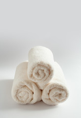 Stack of spa white towels and copy space