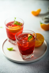 Homemade Negroni cocktail with fresh orange