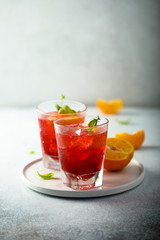 Homemade Negroni cocktail with fresh orange