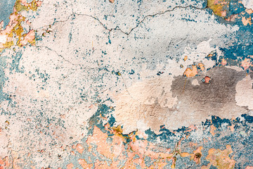 Texture of a concrete wall with cracks and scratches which can be used as a background