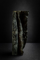 Kombu, seaweed used in Japanese cuisine, also known as dashima or in haidai. Close, shape, texture and dark background