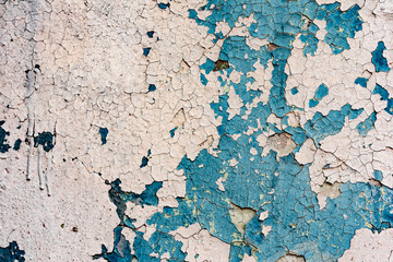 Texture of a concrete wall with cracks and scratches which can be used as a background