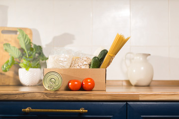 cereals and vegetables are in the kitchen. essential products, charity and helping people in difficult situations