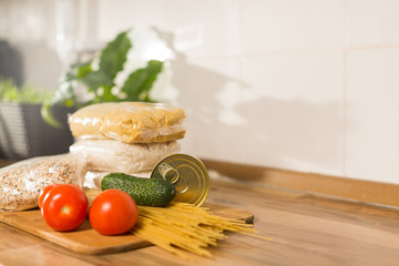 cereals and vegetables are in the kitchen. essential products, charity and helping people in difficult situations