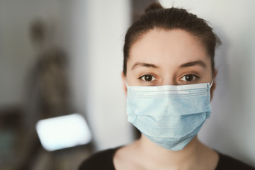 Woman wearing face mask - close up