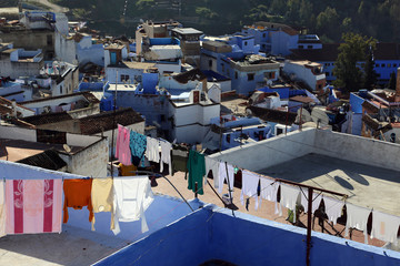 Chefchaouen, Morocco - 02.24.2019: View from the ramparts on the roofs of buildings where locals dry clothes.
