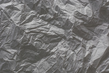 background from crumpled texture paper of gray color