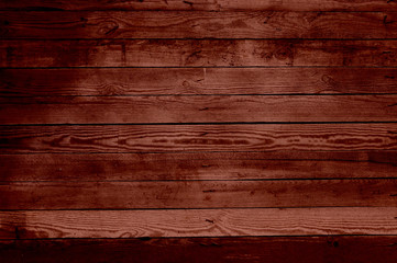 Old red-brown wooden surface. Background of the old red-brown floor. Red brown background