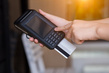 hand with credit card