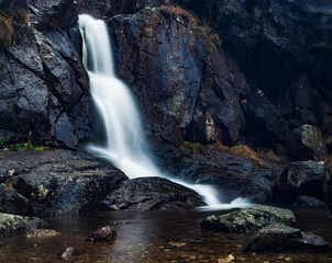 Fototapeta na wymiar Long exposure picture of a waterfall / river.