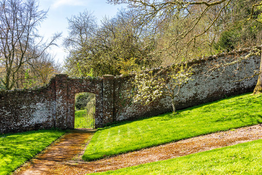 Old Stone Wall with Archway in Public Park