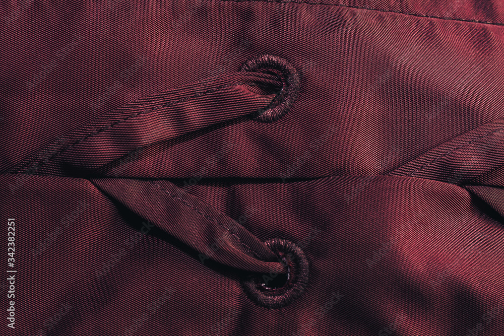 Poster Close up beautiful red textile cloth background with stitching. Macro photography background material view.