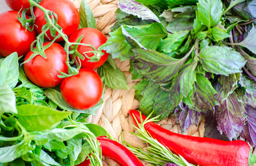 Raw vegetables close up. Top view of fresh tomatoes, basil, eggplant, red pepper and corn. Healthy eating concept, vegetable background. Selective focus image, flat lay.