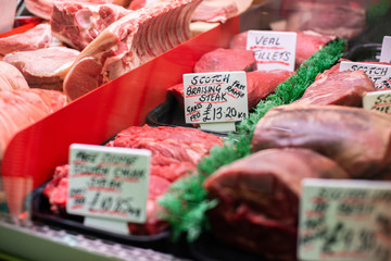 A selection of high-welfare meat on display in a butchers store