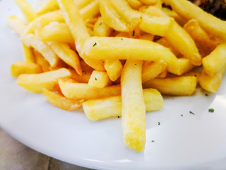 Golden French fries potatoes ready to be eaten
