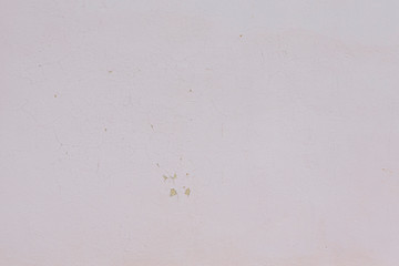 Texture of old pink cement wall with crack background