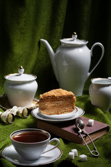 A slice of puff honey cake. Selective focus.