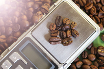Coffee beans on the scales top view