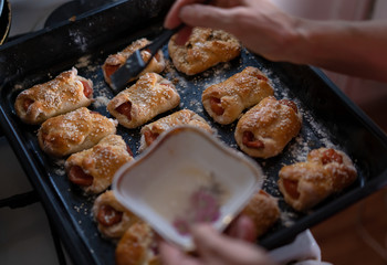 Sweet pastries on a baking sheet from the oven