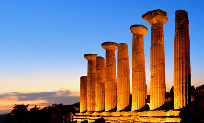 Ruined Temple of Heracles columns in famous ancient Valley of Temples on blue hour sunset in summer...