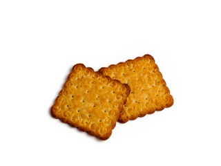 cracker cookies with salt, square shape isolated on a white background