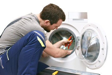 repair washing machine by a service technician at customer's home // insulated on white background