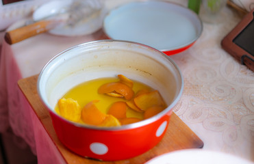 Soaking orange peels for candied fruit