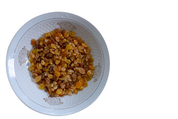 Raisins in a plate as a filling for buns