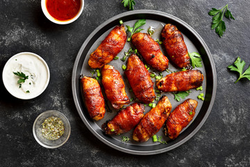 Bacon wrapped grilled chicken wings