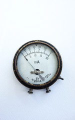 Antique brass Microammeter for measuring, on a white background.