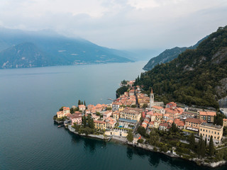 Naklejka na ściany i meble Aerial Drone View of cute italian town on Lake Como